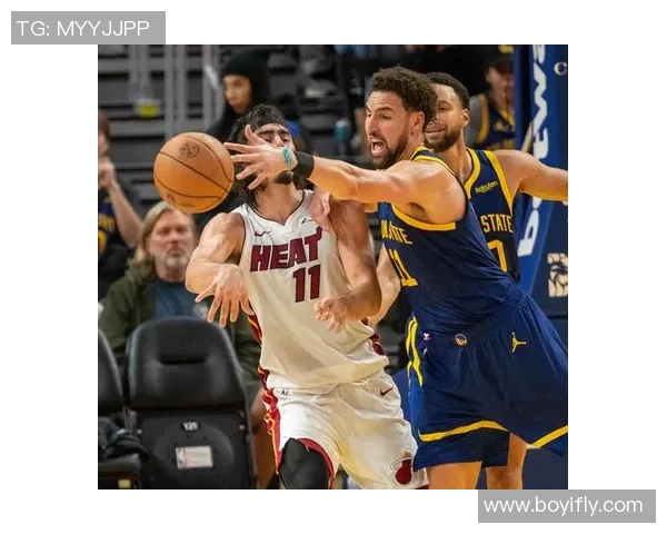 勇士与热火激战11日赛场谁能在这场对决中笑到最后